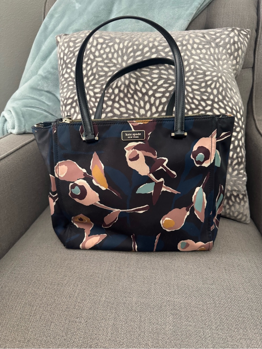 Authentic Kate Spade, navy floral tote with pink, teal and mustard accents